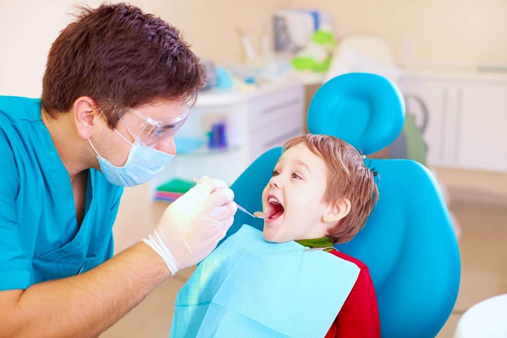 dentist treating a child