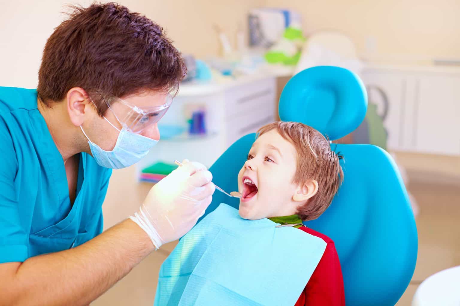 dentist treating a child