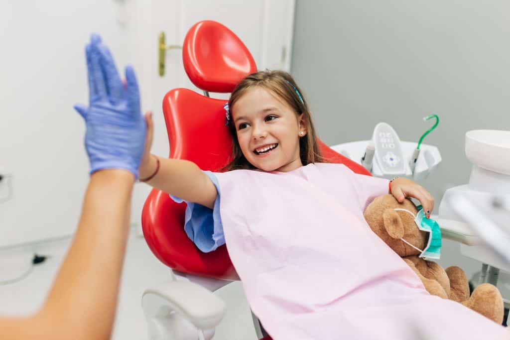child-feeling-happy-at-the-dentist