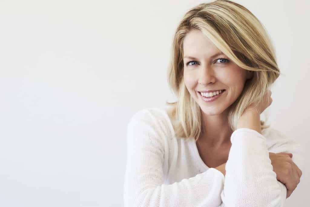 lady smiling after cosmetic treatment